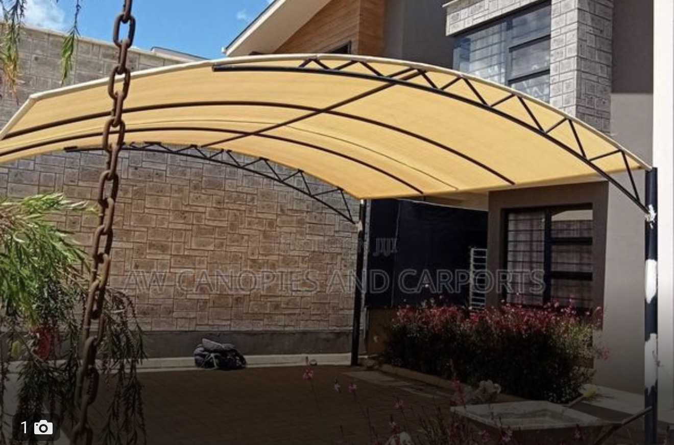 Single-bay carport with board roofing