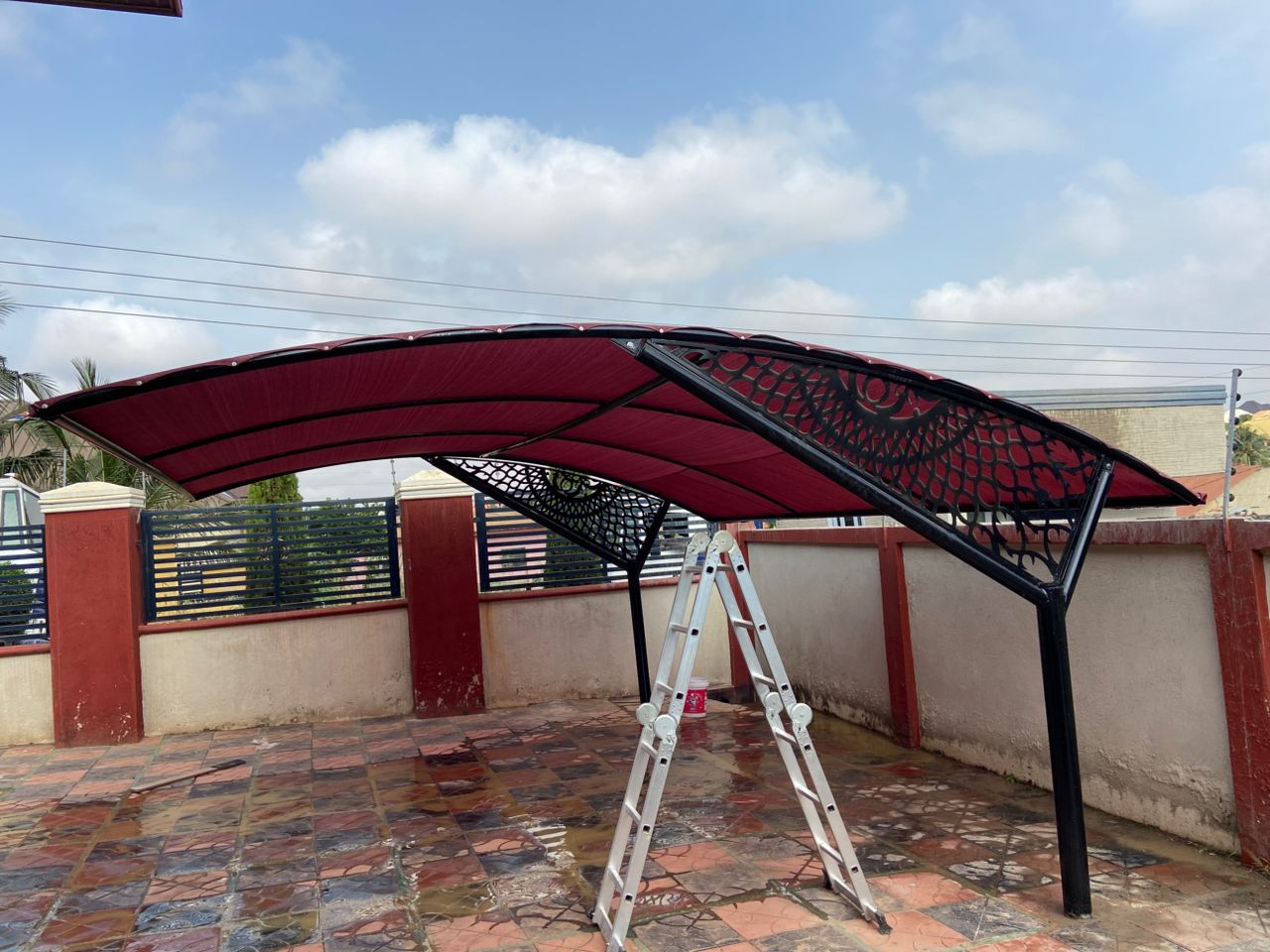 Carport with fabric roofing
